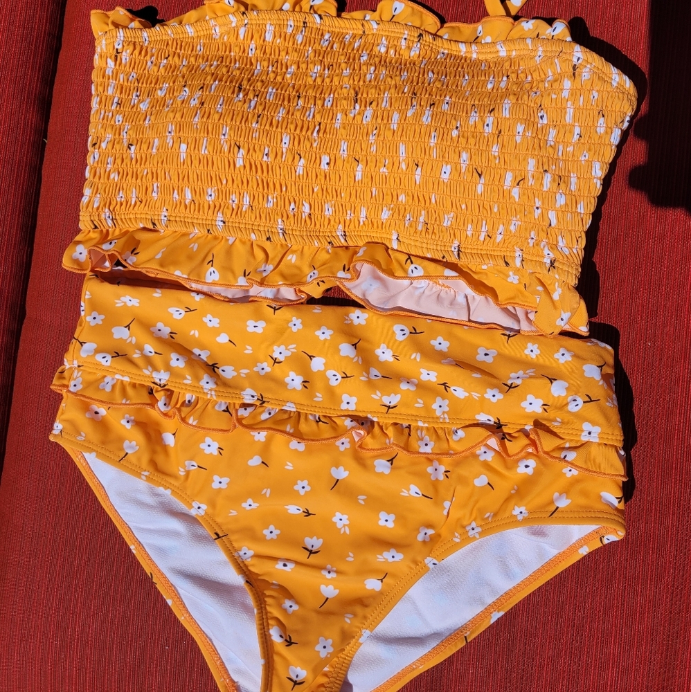 Ruched top and high waisted bottoms swimsuit